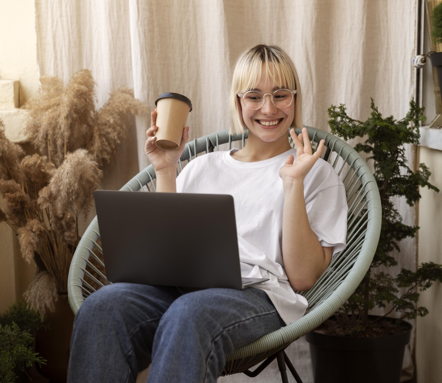 young-blonde-woman-working-from-home-her-chair (2)